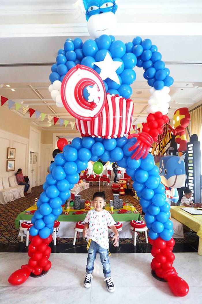 Kid with Captain America Balloon Sculpture